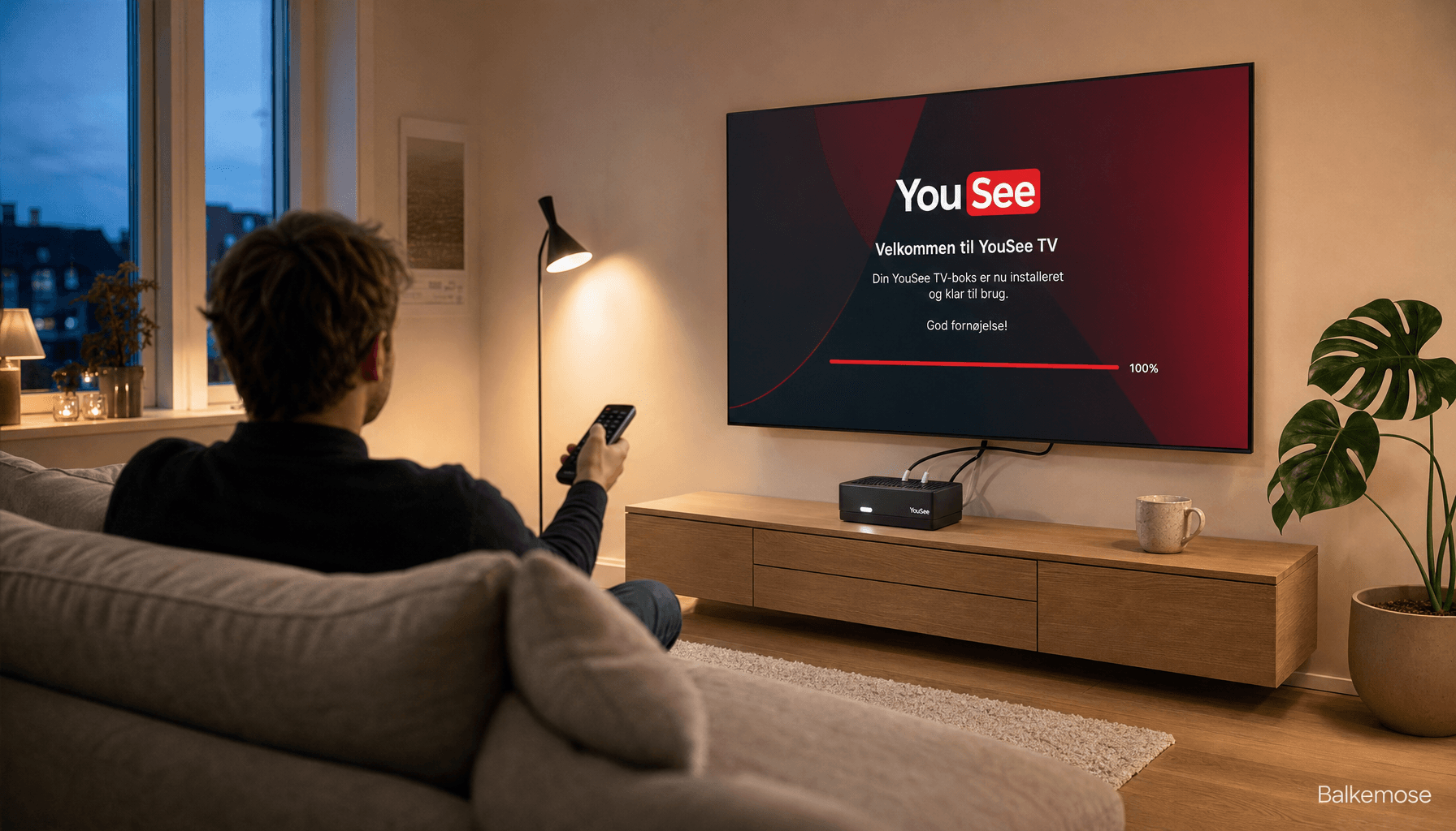 Mand aktiverer YouSee TV-boks i stue